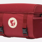 A red handlebar bag with side and top mesh pockets, and a logo that suggests a collaboration between Specialized and Fjallraven.